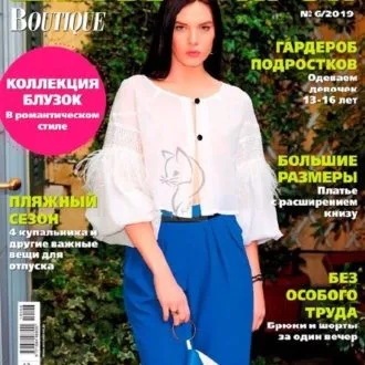 Сукня з коміром-стійкою та асиметричним подолом